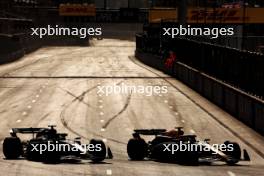 George Russell (GBR) Mercedes AMG F1 W15 and Max Verstappen (NLD) Red Bull Racing RB20 battle for position. 15.09.2024. Formula 1 World Championship, Rd 17, Azerbaijan Grand Prix, Baku Street Circuit, Azerbaijan, Race Day.