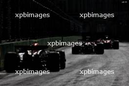 Oscar Piastri (AUS) McLaren MCL38 leads Charles Leclerc (MON) Ferrari SF-24 and Sergio Perez (MEX) Red Bull Racing RB20. 15.09.2024. Formula 1 World Championship, Rd 17, Azerbaijan Grand Prix, Baku Street Circuit, Azerbaijan, Race Day.