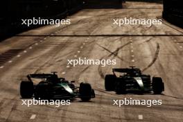 Fernando Alonso (ESP) Aston Martin F1 Team AMR24 and Daniel Ricciardo (AUS) RB VCARB 01 battle for position. 15.09.2024. Formula 1 World Championship, Rd 17, Azerbaijan Grand Prix, Baku Street Circuit, Azerbaijan, Race Day.