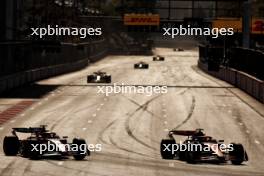 (L to R): Charles Leclerc (MON) Ferrari SF-24 and Oscar Piastri (AUS) McLaren MCL38 battle for the lead of the race. 15.09.2024. Formula 1 World Championship, Rd 17, Azerbaijan Grand Prix, Baku Street Circuit, Azerbaijan, Race Day.