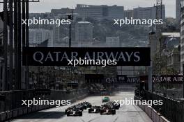 Charles Leclerc (MON) Ferrari SF-24 leads at the start of the race. 15.09.2024. Formula 1 World Championship, Rd 17, Azerbaijan Grand Prix, Baku Street Circuit, Azerbaijan, Race Day.