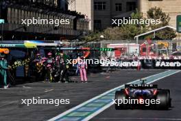 Pierre Gasly (FRA) Alpine F1 Team A524 makes a pit stop. 15.09.2024. Formula 1 World Championship, Rd 17, Azerbaijan Grand Prix, Baku Street Circuit, Azerbaijan, Race Day.