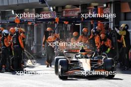 Lando Norris (GBR) McLaren MCL38 makes a pit stop. 15.09.2024. Formula 1 World Championship, Rd 17, Azerbaijan Grand Prix, Baku Street Circuit, Azerbaijan, Race Day.