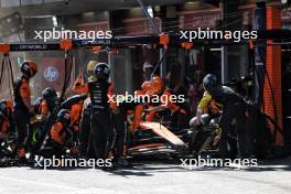 Lando Norris (GBR) McLaren MCL38 makes a pit stop. 15.09.2024. Formula 1 World Championship, Rd 17, Azerbaijan Grand Prix, Baku Street Circuit, Azerbaijan, Race Day.