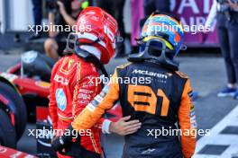 (L to R): Charles Leclerc (MON) Ferrari celebrates his pole position in qualifying parc ferme with second placed Oscar Piastri (AUS) McLaren. 14.09.2024. Formula 1 World Championship, Rd 17, Azerbaijan Grand Prix, Baku Street Circuit, Azerbaijan, Qualifying Day.