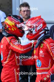 (L to R): Third placed Carlos Sainz Jr (ESP) Ferrari congratulates team mate and pole sitter Charles Leclerc (MON) Ferrari in qualifying parc ferme. 14.09.2024. Formula 1 World Championship, Rd 17, Azerbaijan Grand Prix, Baku Street Circuit, Azerbaijan, Qualifying Day.