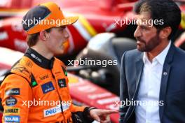 (L to R): Oscar Piastri (AUS) McLaren in qualifying parc ferme with Mohammed Bin Sulayem (UAE) FIA President. 14.09.2024. Formula 1 World Championship, Rd 17, Azerbaijan Grand Prix, Baku Street Circuit, Azerbaijan, Qualifying Day.