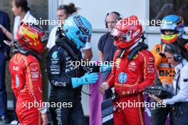 (L to R): Carlos Sainz Jr (ESP) Ferrari in qualifying parc ferme with George Russell (GBR) Mercedes AMG F1; pole sitter Charles Leclerc (MON) Ferrari; and Oscar Piastri (AUS) McLaren. 14.09.2024. Formula 1 World Championship, Rd 17, Azerbaijan Grand Prix, Baku Street Circuit, Azerbaijan, Qualifying Day.