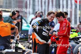 (L to R): Second placed Oscar Piastri (AUS) McLaren in qualifying parc ferme with pole sitter Charles Leclerc (MON) Ferrari. 14.09.2024. Formula 1 World Championship, Rd 17, Azerbaijan Grand Prix, Baku Street Circuit, Azerbaijan, Qualifying Day.