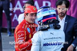 (L to R): Charles Leclerc (MON) Ferrari celebrates his pole position in qualifying parc ferme with Franco Colapinto (ARG) Williams Racing. 14.09.2024. Formula 1 World Championship, Rd 17, Azerbaijan Grand Prix, Baku Street Circuit, Azerbaijan, Qualifying Day.