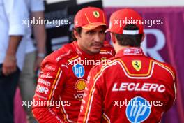 Pole sitter Charles Leclerc (MON) Ferrari in qualifying parc ferme with third placed team mate Carlos Sainz Jr (ESP) Ferrari. 14.09.2024. Formula 1 World Championship, Rd 17, Azerbaijan Grand Prix, Baku Street Circuit, Azerbaijan, Qualifying Day.