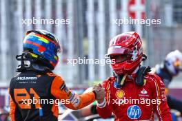 Charles Leclerc (MON) Ferrari (Right) celebrates his pole position in qualifying parc ferme with second placed Oscar Piastri (AUS) McLaren. 14.09.2024. Formula 1 World Championship, Rd 17, Azerbaijan Grand Prix, Baku Street Circuit, Azerbaijan, Qualifying Day.