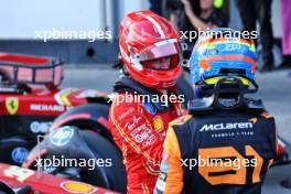 (L to R): Charles Leclerc (MON) Ferrari celebrates his pole position in qualifying parc ferme with second placed Oscar Piastri (AUS) McLaren. 14.09.2024. Formula 1 World Championship, Rd 17, Azerbaijan Grand Prix, Baku Street Circuit, Azerbaijan, Qualifying Day.