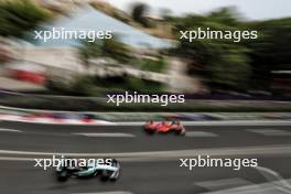 Charles Leclerc (MON) Ferrari SF-24 and Lewis Hamilton (GBR) Mercedes AMG F1 W15. 14.09.2024. Formula 1 World Championship, Rd 17, Azerbaijan Grand Prix, Baku Street Circuit, Azerbaijan, Qualifying Day.