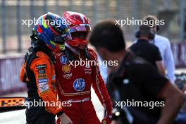 (L to R): Oscar Piastri (AUS) McLaren in qualifying parc ferme with pole sitter Charles Leclerc (MON) Ferrari. 14.09.2024. Formula 1 World Championship, Rd 17, Azerbaijan Grand Prix, Baku Street Circuit, Azerbaijan, Qualifying Day.