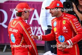 (L to R): Pole sitter Charles Leclerc (MON) Ferrari in qualifying parc ferme with third placed team mate Carlos Sainz Jr (ESP) Ferrari. 14.09.2024. Formula 1 World Championship, Rd 17, Azerbaijan Grand Prix, Baku Street Circuit, Azerbaijan, Qualifying Day.