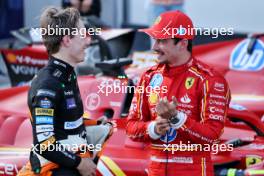 (L to R): Second placed Oscar Piastri (AUS) McLaren in qualifying parc ferme with pole sitter Charles Leclerc (MON) Ferrari. 14.09.2024. Formula 1 World Championship, Rd 17, Azerbaijan Grand Prix, Baku Street Circuit, Azerbaijan, Qualifying Day.