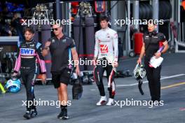 Pierre Gasly (FRA) Alpine F1 Team and Oliver Bearman (GBR) Haas F1 Team. 14.09.2024. Formula 1 World Championship, Rd 17, Azerbaijan Grand Prix, Baku Street Circuit, Azerbaijan, Qualifying Day.