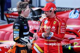 (L to R): Second placed Oscar Piastri (AUS) McLaren in qualifying parc ferme with pole sitter Charles Leclerc (MON) Ferrari. 14.09.2024. Formula 1 World Championship, Rd 17, Azerbaijan Grand Prix, Baku Street Circuit, Azerbaijan, Qualifying Day.