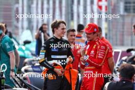 (L to R): Second placed Oscar Piastri (AUS) McLaren in qualifying parc ferme with pole sitter Charles Leclerc (MON) Ferrari. 14.09.2024. Formula 1 World Championship, Rd 17, Azerbaijan Grand Prix, Baku Street Circuit, Azerbaijan, Qualifying Day.