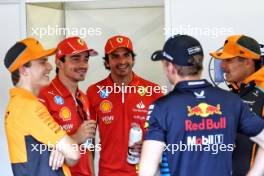 (L to R): Oscar Piastri (AUS) McLaren; Charles Leclerc (MON) Ferrari; Carlos Sainz Jr (ESP) Ferrari; Max Verstappen (NLD) Red Bull Racing; and Lando Norris (GBR) McLaren, on the drivers' parade. 15.09.2024. Formula 1 World Championship, Rd 17, Azerbaijan Grand Prix, Baku Street Circuit, Azerbaijan, Race Day.