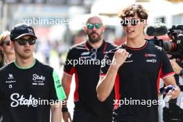 Guanyu Zhou (CHI), Sauber F1 Team Oliver Bearman (GBR), Haas F1 Team F1 Team 12.09.2024. Formula 1 World Championship, Rd 17, Azerbaijan Grand Prix, Baku Street Circuit, Azerbaijan, Preparation Day.