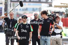 Guanyu Zhou (CHI), Sauber F1 Team Oliver Bearman (GBR), Haas F1 Team F1 Team 12.09.2024. Formula 1 World Championship, Rd 17, Azerbaijan Grand Prix, Baku Street Circuit, Azerbaijan, Preparation Day.