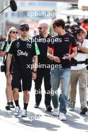 Guanyu Zhou (CHI), Sauber F1 Team Oliver Bearman (GBR), Haas F1 Team F1 Team 12.09.2024. Formula 1 World Championship, Rd 17, Azerbaijan Grand Prix, Baku Street Circuit, Azerbaijan, Preparation Day.