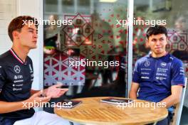 (L to R): George Russell (GBR) Mercedes AMG F1 with Alexander Albon (THA) Williams Racing. 12.09.2024. Formula 1 World Championship, Rd 17, Azerbaijan Grand Prix, Baku Street Circuit, Azerbaijan, Preparation Day.