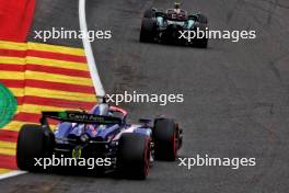 Lewis Hamilton (GBR) Mercedes AMG F1 W15 and Daniel Ricciardo (AUS) RB VCARB 01. 26.07.2024. Formula 1 World Championship, Rd 14, Belgian Grand Prix, Spa Francorchamps, Belgium, Practice Day.