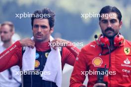 Carlos Sainz Jr (ESP) Ferrari on the grid. 28.07.2024. Formula 1 World Championship, Rd 14, Belgian Grand Prix, Spa Francorchamps, Belgium, Race Day.