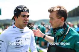 (L to R): Lance Stroll (CDN) Aston Martin F1 Team with Andrew Vizard (GBR) Aston Martin F1 Team Race Enginner on the grid. 28.07.2024. Formula 1 World Championship, Rd 14, Belgian Grand Prix, Spa Francorchamps, Belgium, Race Day.