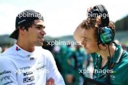 (L to R): Lance Stroll (CDN) Aston Martin F1 Team with Andrew Vizard (GBR) Aston Martin F1 Team Race Enginner on the grid. 28.07.2024. Formula 1 World Championship, Rd 14, Belgian Grand Prix, Spa Francorchamps, Belgium, Race Day.