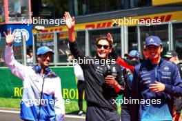 (L to R): Daniel Ricciardo (AUS) RB; George Russell (GBR) Mercedes AMG F1; and Alexander Albon (THA) Williams Racing, on the drivers' parade. 28.07.2024. Formula 1 World Championship, Rd 14, Belgian Grand Prix, Spa Francorchamps, Belgium, Race Day.