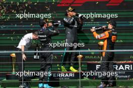 The podium (L to R): Lewis Hamilton (GBR) Mercedes AMG F1, second; Joey McMillan (GBR) Mercedes AMG F1 Lead Race Strategist; George Russell (GBR) Mercedes AMG F1, race winner; Oscar Piastri (AUS) McLaren, third. 28.07.2024. Formula 1 World Championship, Rd 14, Belgian Grand Prix, Spa Francorchamps, Belgium, Race Day.