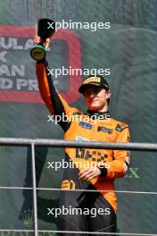 Oscar Piastri (AUS) McLaren celebrates his third position on the podium. 28.07.2024. Formula 1 World Championship, Rd 14, Belgian Grand Prix, Spa Francorchamps, Belgium, Race Day.