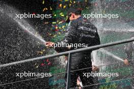 Race winner George Russell (GBR) Mercedes AMG F1 celebrates on the podium. 28.07.2024. Formula 1 World Championship, Rd 14, Belgian Grand Prix, Spa Francorchamps, Belgium, Race Day.