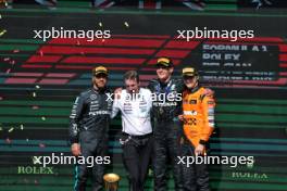 The podium (L to R): Lewis Hamilton (GBR) Mercedes AMG F1, second; Joey McMillan (GBR) Mercedes AMG F1 Lead Race Strategist; George Russell (GBR) Mercedes AMG F1, race winner; Oscar Piastri (AUS) McLaren, third. 28.07.2024. Formula 1 World Championship, Rd 14, Belgian Grand Prix, Spa Francorchamps, Belgium, Race Day.