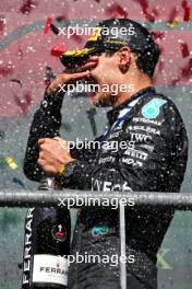 Race winner George Russell (GBR) Mercedes AMG F1 celebrates on the podium. 28.07.2024. Formula 1 World Championship, Rd 14, Belgian Grand Prix, Spa Francorchamps, Belgium, Race Day.