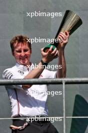 Joey McMillan (GBR) Mercedes AMG F1 Lead Race Strategist celebrates on the podium. 28.07.2024. Formula 1 World Championship, Rd 14, Belgian Grand Prix, Spa Francorchamps, Belgium, Race Day.