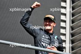 Race winner George Russell (GBR) Mercedes AMG F1 celebrates on the podium. 28.07.2024. Formula 1 World Championship, Rd 14, Belgian Grand Prix, Spa Francorchamps, Belgium, Race Day.