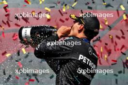 Race winner George Russell (GBR) Mercedes AMG F1 celebrates on the podium. 28.07.2024. Formula 1 World Championship, Rd 14, Belgian Grand Prix, Spa Francorchamps, Belgium, Race Day.