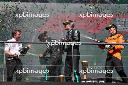 The podium (L to R): Joey McMillan (GBR) Mercedes AMG F1 Lead Race Strategist; Lewis Hamilton (GBR) Mercedes AMG F1, second; George Russell (GBR) Mercedes AMG F1, race winner; Oscar Piastri (AUS) McLaren, third. 28.07.2024. Formula 1 World Championship, Rd 14, Belgian Grand Prix, Spa Francorchamps, Belgium, Race Day.