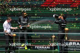 The podium (L to R): Joey McMillan (GBR) Mercedes AMG F1 Lead Race Strategist; Lewis Hamilton (GBR) Mercedes AMG F1, second; George Russell (GBR) Mercedes AMG F1, race winner. 28.07.2024. Formula 1 World Championship, Rd 14, Belgian Grand Prix, Spa Francorchamps, Belgium, Race Day.