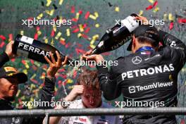 Race winner George Russell (GBR) Mercedes AMG F1 celebrates on the podium with Joey McMillan (GBR) Mercedes AMG F1 Lead Race Strategist and Lewis Hamilton (GBR) Mercedes AMG F1. 28.07.2024. Formula 1 World Championship, Rd 14, Belgian Grand Prix, Spa Francorchamps, Belgium, Race Day.