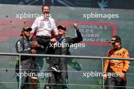 The podium (L to R): Lewis Hamilton (GBR) Mercedes AMG F1, second; Joey McMillan (GBR) Mercedes AMG F1 Lead Race Strategist; George Russell (GBR) Mercedes AMG F1, race winner; Oscar Piastri (AUS) McLaren, third. 28.07.2024. Formula 1 World Championship, Rd 14, Belgian Grand Prix, Spa Francorchamps, Belgium, Race Day.