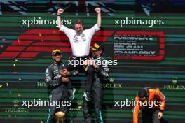 The podium (L to R): Lewis Hamilton (GBR) Mercedes AMG F1, second; Joey McMillan (GBR) Mercedes AMG F1 Lead Race Strategist; George Russell (GBR) Mercedes AMG F1, race winner; Oscar Piastri (AUS) McLaren, third. 28.07.2024. Formula 1 World Championship, Rd 14, Belgian Grand Prix, Spa Francorchamps, Belgium, Race Day.