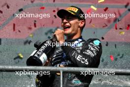 Race winner George Russell (GBR) Mercedes AMG F1 celebrates on the podium. 28.07.2024. Formula 1 World Championship, Rd 14, Belgian Grand Prix, Spa Francorchamps, Belgium, Race Day.