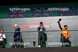 The podium (L to R): Joey McMillan (GBR) Mercedes AMG F1 Lead Race Strategist; Lewis Hamilton (GBR) Mercedes AMG F1, second; George Russell (GBR) Mercedes AMG F1, race winner; Oscar Piastri (AUS) McLaren, third. 28.07.2024. Formula 1 World Championship, Rd 14, Belgian Grand Prix, Spa Francorchamps, Belgium, Race Day.