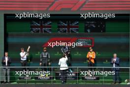 The podium (L to R): Joey McMillan (GBR) Mercedes AMG F1 Lead Race Strategist; Lewis Hamilton (GBR) Mercedes AMG F1, second; George Russell (GBR) Mercedes AMG F1, race winner; Oscar Piastri (AUS) McLaren, third. 28.07.2024. Formula 1 World Championship, Rd 14, Belgian Grand Prix, Spa Francorchamps, Belgium, Race Day.